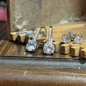 Set of three sterling silver earrings with simulated diamonds. NWT